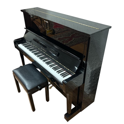 166 - A KAWAI BLACK LACQUERED CASED UPRIGHT PIANO steel frame, over string and under damper Serial No. 198... 