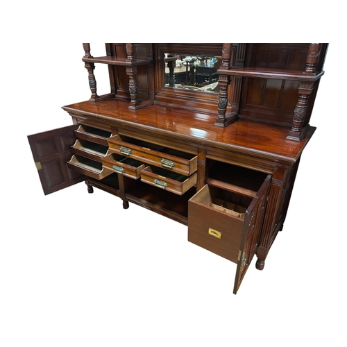167 - A VERY FINE EDWARDIAN CARVED MAHOGANY SIDEBOARD the superstructure with moulded cornice above a cent... 
