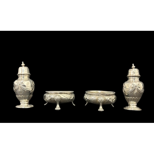 468 - A PAIR OF VICTORIAN SILVER SALTS London 1863 together with A PAIR OF SILVER PEPPERS Birmingham c.190... 