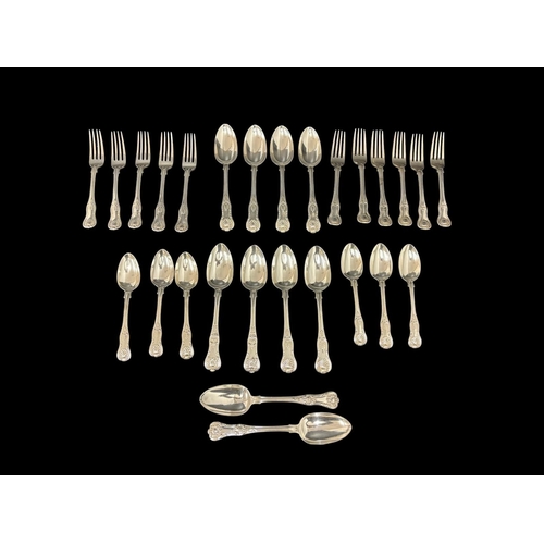 A LARGE COLLECTION OF FLATWARE IN KING'S AND QUEEN'S PATTERN to include a set of six marked for Samuel Neville Dublin 1825 (approx. 19oz)
A set of four spoons London 1826 (approx. 12oz)
A set of six spoons London 1834 (approx. 19oz)
A set of six forks Samuel Neville Dublin 1825 (approx. 19oz )
A set of six spoons London 1839 (approx. 13.5oz)
Total weight approx. 2080g (67 troy ozs.)