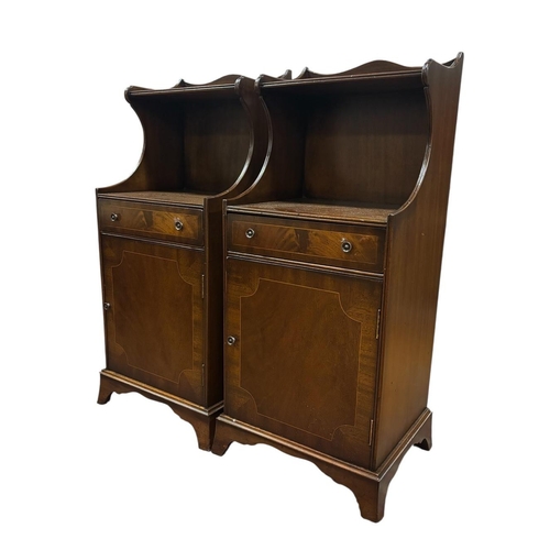 190 - A PAIR OF VINTAGE MAHOGANY PEDESTALS each of rectangular form the superstructure with moulded shelf ... 