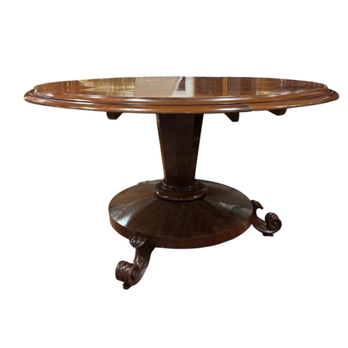 217 - A 19TH CENTURY MAHOGANY SNAP TOP POD TABLE the circular moulded top above a faceted column on platfo... 