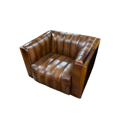 219 - A FINE ART DECO STYLE CHERRYWOOD AND HIDE UPHOLSTERED ARMCHAIR of rectangular form with hide upholst... 