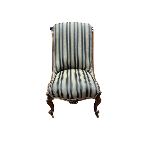 191 - A 19TH CENTURY ROSEWOOD AND UPHOLSTERED SIDE CHAIR the upholstered scroll back and seat on cabriole ... 
