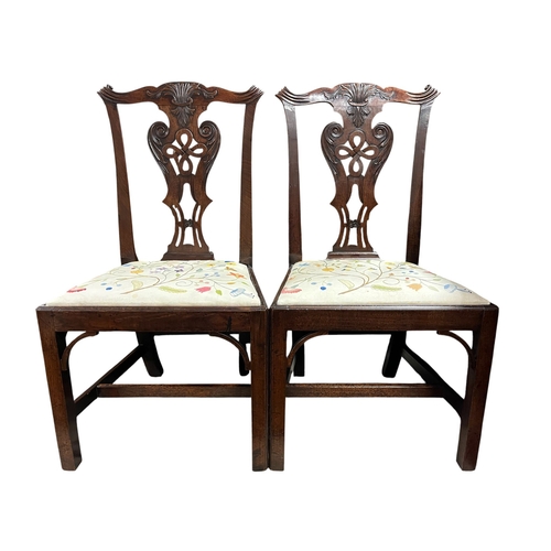 230 - A PAIR OF IRISH CHIPPENDALE SIDE CHAIRS c.1760 each with a serpentine carved top rail with pierced f... 