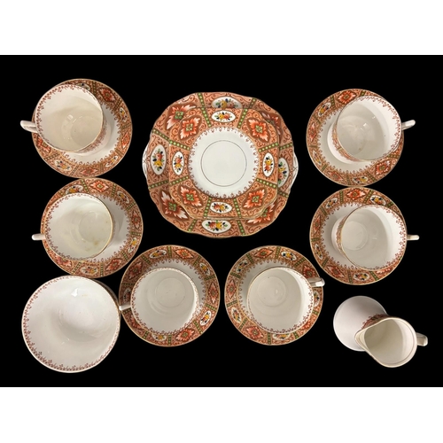 292 - A VINTAGE SALISBURY 'ROSE' FINE BONE CHINA TEA SERVICE comprising six cups and six deep set saucers,... 