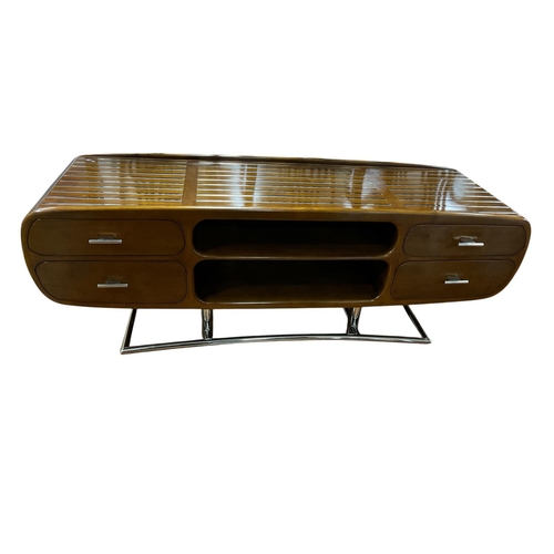 AN ART DECO STYLE CHERRYWOOD AND CHROME CONSOLE TABLE the rectangular shaped top with two open compartments flanked on each side by two short drawers on tubular chrome supports 55cm (h) x 147cm (w) x 45cm (d)