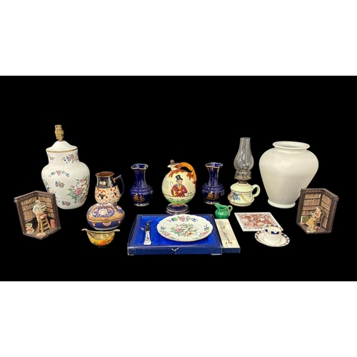 479 - A COLLECTION OF DECORATIVE ITEMS to include a matched pair of gilt cobalt blue Limoges vases and a s... 