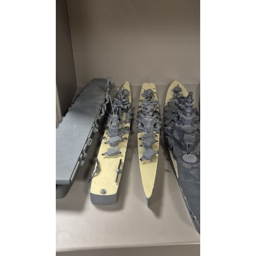 269 - A GOOD COLLECTION OF MODEL WARSHIPS, etc. Various makers including Corgi. Mid 20th century.