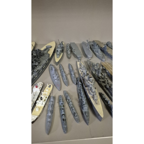 269 - A GOOD COLLECTION OF MODEL WARSHIPS, etc. Various makers including Corgi. Mid 20th century.