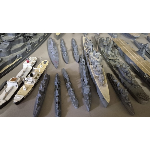 269 - A GOOD COLLECTION OF MODEL WARSHIPS, etc. Various makers including Corgi. Mid 20th century.