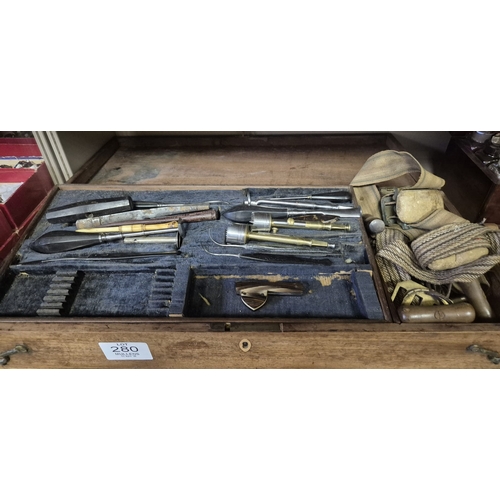 280 - AN ANTIQUE CASED FIELD SURGEONS SET to include a miscellaneous collection of antique surgeon's medic... 