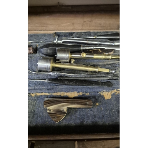 280 - AN ANTIQUE CASED FIELD SURGEONS SET to include a miscellaneous collection of antique surgeon's medic... 