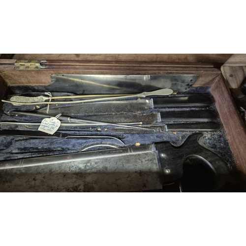 280 - AN ANTIQUE CASED FIELD SURGEONS SET to include a miscellaneous collection of antique surgeon's medic... 