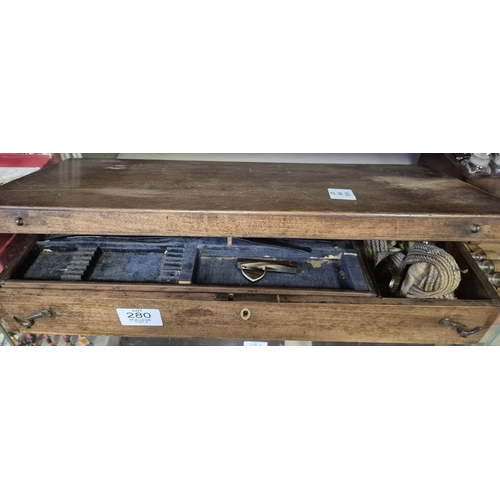 280 - AN ANTIQUE CASED FIELD SURGEONS SET to include a miscellaneous collection of antique surgeon's medic... 