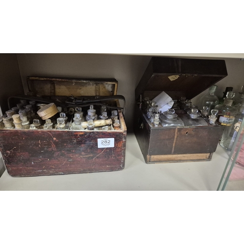 282 - A CASED APOTHECARY SET including numerous labelled vials, bottles, etc. Some still containing conten... 