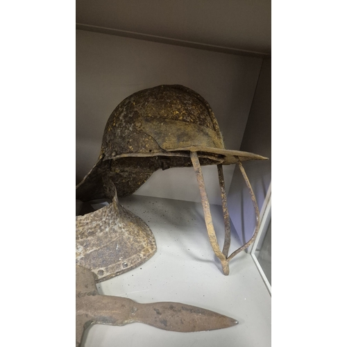 285 - A 17TH CENTURY MORION HELMET Probably Spanish. In relic condition together with two other antique he... 