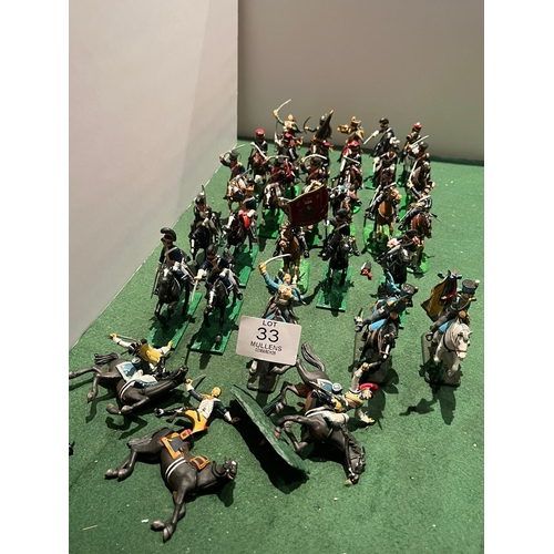 33 - MODEL SOLDIERS: Mainly cavalry to include fallen horsemen, etc.