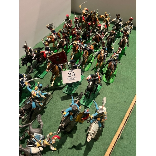 33 - MODEL SOLDIERS: Mainly cavalry to include fallen horsemen, etc.