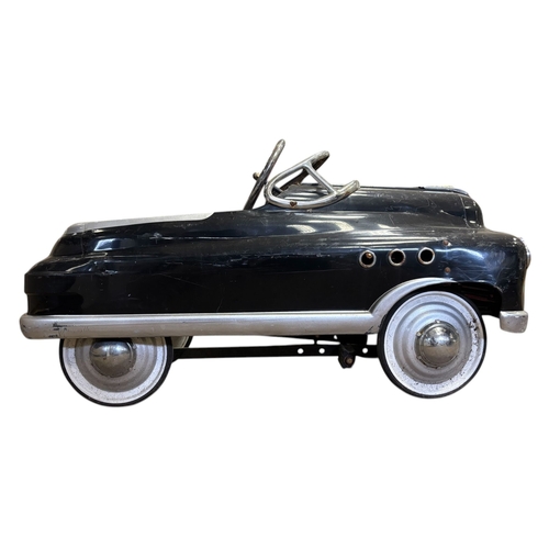 349 - A VINTAGE CHILD'S PEDAL CAR in the style of an American sedan Approx. 100cm (l)