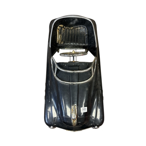 349 - A VINTAGE CHILD'S PEDAL CAR in the style of an American sedan Approx. 100cm (l)