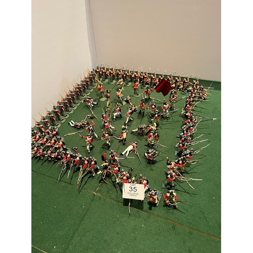 35 - MODEL SOLDIERS: Mainly riflemen including flag bearer.