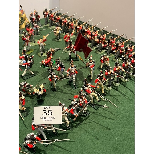 35 - MODEL SOLDIERS: Mainly riflemen including flag bearer.