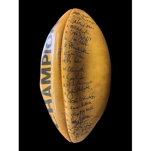 357 - LIONS TOUR OF NEW ZEALAND: A Dunlop champion rugby ball signed by the Lions team from its 1983 tour ... 