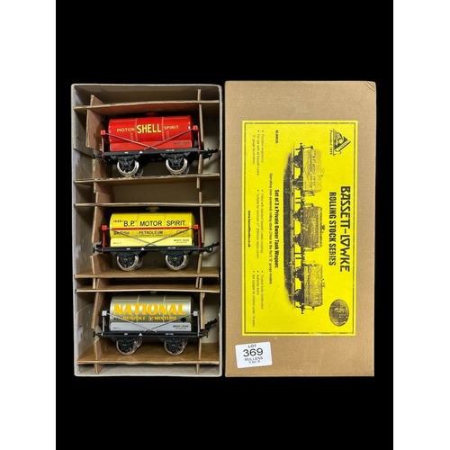 369 - BASSETT LOWKE ROLLING STOCK SERIES Set of three private owner tank wagons. 0 gauge. In original box.