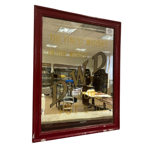 402 - A VINTAGE D.W.D. PURE POT STILL whiskey advertising mirror. Approx. 58cm (h) x 45cm (w)