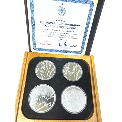 227 - CANADA: Four coin Olympic proof set 1976 comprising 4.4oz of fine silver. Boxed with Certificate of ... 
