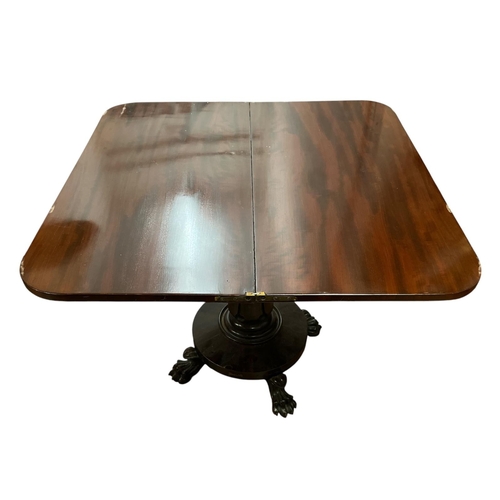 42 - A 19TH CENTURY MAHOGANY FOLDOVER SUPPER TABLE the rectangular hinged top with shaped frieze above a ... 