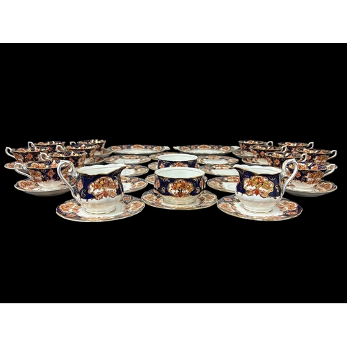 274 - A TWELVE SETTING ROYAL ALBERT BONE CHINA TEA SERVICE in the heirloom pattern with polychromatic flor... 