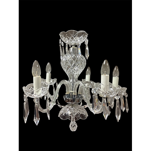 281 - A WATERFORD CUT GLASS FIVE BRANCH CHANDELIER hung with faceted chains and pendant drops (lacking one... 