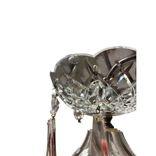 281 - A WATERFORD CUT GLASS FIVE BRANCH CHANDELIER hung with faceted chains and pendant drops (lacking one... 