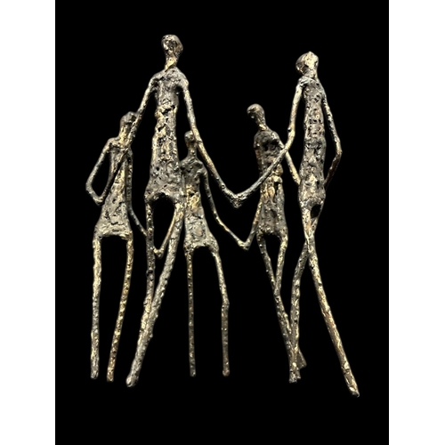 807 - in the manner of ALBERTO GIACOMETTI Five encircled figures cast iron 24cm (h)