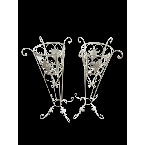 207 - A PAIR OF WROUGHT IRON JARDINIERE STANDS each of cylindrical tapering form the pierced C-scroll frie... 