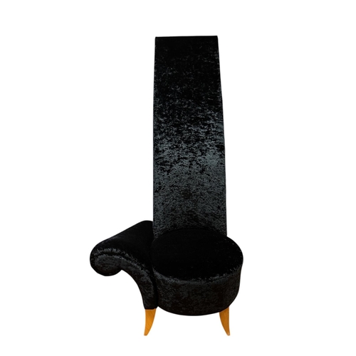 336 - AN AQUINOS HIGH BACK VELVET UPHOLSTERED CHAIR with scroll arm and shaped seat on sabre legs
