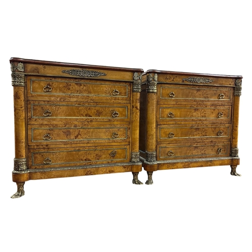A PAIR OF FRENCH EMPIRE STYLE BURR WALNUT CHEST OF DRAWERS the rectangular tops with rounded turret front corners and beaded brass trim over conformed gilt brass mounted friezes and four drawers flanked by engaged columns and raised on cast brass paw feet 86cm (h) x 90cm (w) x 45cm (d)