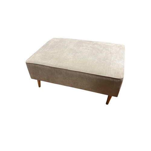 370 - A BEECHWOOD AND UPHOLSTERED STOOL the rectangular upholstered seat raised on cylindrical tapering le... 