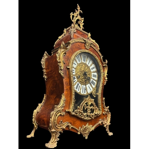 123 - A FRENCH ROCOCO ORMOLU AND BURR WALNUT PENDULUM MANTEL CLOCK with movement stamped 'F.H.S.' (Franz H... 