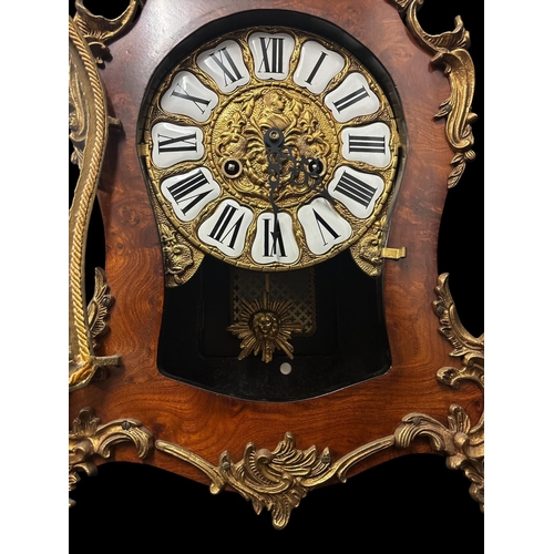 123 - A FRENCH ROCOCO ORMOLU AND BURR WALNUT PENDULUM MANTEL CLOCK with movement stamped 'F.H.S.' (Franz H... 