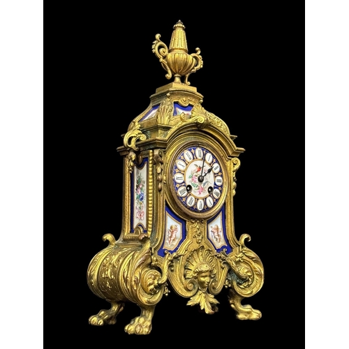 138 - A 19TH CENTURY FRENCH ORMOLU AND PORCELAIN BOUDOIR CLOCK featuring hand painted Sevres style porcela... 