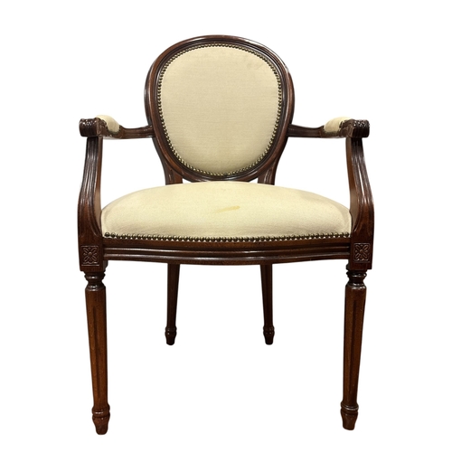 21 - A CONTINENTAL BEECHWOOD MARQUETRY AND GILT BRASS MOUNTED OCCASIONAL TABLE of oval outline the shaped... 