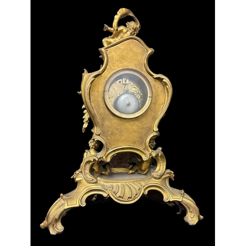 271 - A FRENCH 19TH CENTURY GILT BRONZE THREE PIECE CLOCK GARNITURE comprising a large Rococo style mantel... 