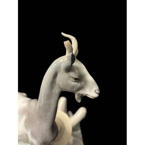 273 - A LARGE LLADRO PORCELAIN FIGURAL GROUP of shepherd sleeping alongside a nanny goat, kid and dog 36cm... 