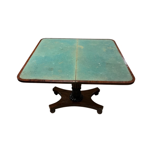36 - A 19TH CENTURY MAHOGANY FOLDOVER CARD TABLE the rectangular hinged top above a pilaster frieze lobed... 