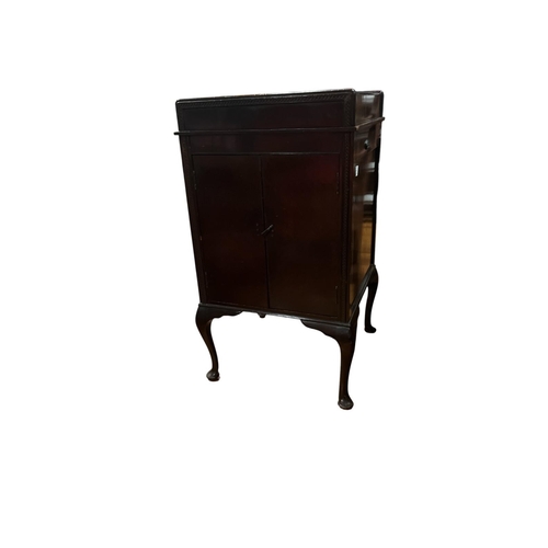 372 - AN EARLY 20TH CENTURY ACADEMY GRAMOPHONE CABINET the top opening onto turntable and front cabinet li... 