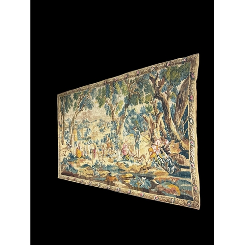 A VINTAGE FRENCH STYLE EMBROIDERED TAPESTRY with polychromatic courtship and hunting scene vignettes 236cm (l) x 145cm (w)