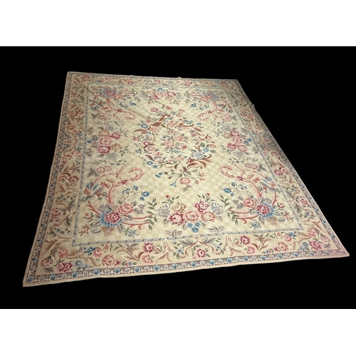 517 - A VINTAGE FRENCH AUBUSSON TAPESTRY with red, blue, green and lavender floral motifs on a cream groun... 